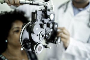 Lady getting an eye exam