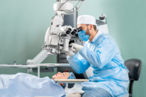 Surgeon examining woman during cataract surgery in St. George, UT