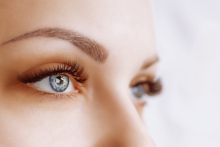 Eyelash Extension Procedure. Woman Eye with Long Eyelashes. Close up, selective focus brow lift mesquite nv