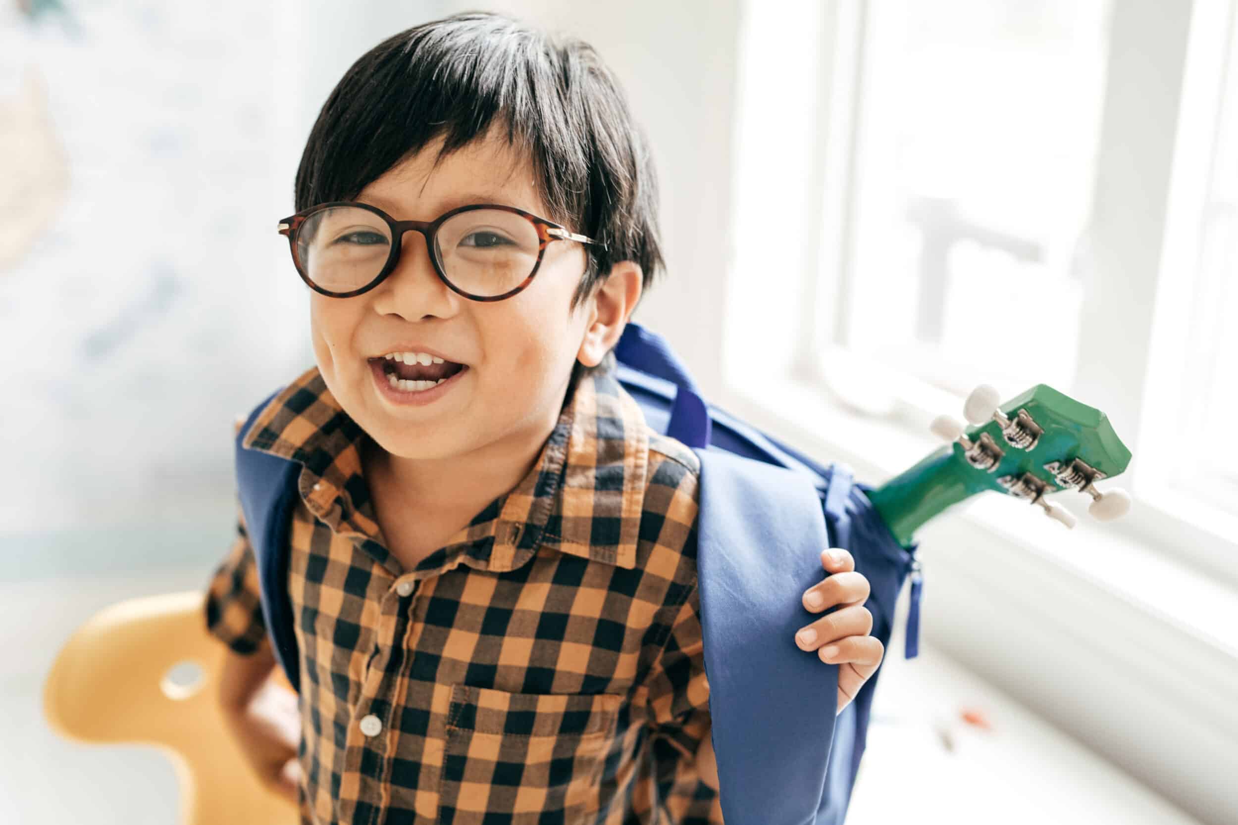 Woman pulling at her eyelid skin Child wearing glasses representing pediatric eye exams and children’s vision care.